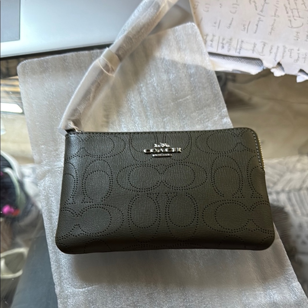 Coach Black Leather Wristlet with Signature Embossed Pattern